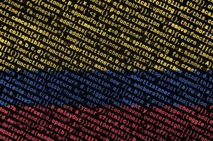 Colombia flag  is depicted on the screen with the program code. The concept of modern technology and site development photo