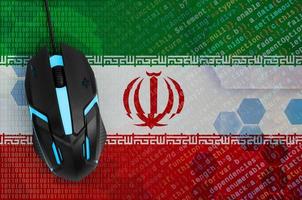 Iran flag  and computer mouse. Digital threat, illegal actions on the Internet photo