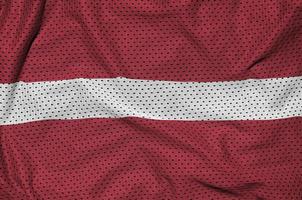 Latvia flag printed on a polyester nylon sportswear mesh fabric photo