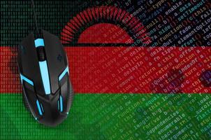Malawi flag  and computer mouse. Digital threat, illegal actions on the Internet photo