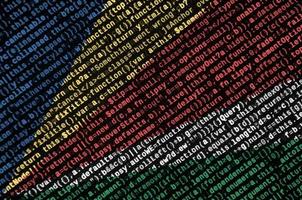 Seychelles flag  is depicted on the screen with the program code. The concept of modern technology and site development photo