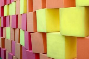 Wall of paralon soft cubes in dry pool, trampoline in the childrens center photo