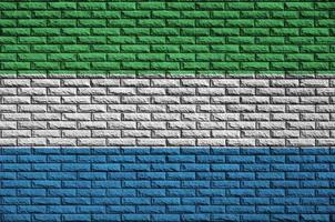 Sierra Leone flag is painted onto an old brick wall photo