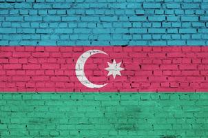 Azerbaijan flag is painted onto an old brick wall photo