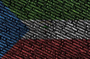 Equatorial Guinea flag  is depicted on the screen with the program code. The concept of modern technology and site development photo