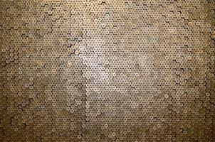 Pattern of 12 gauge cartridges for shotgun bullets. Shells for hunting rifle close up. Backdrop for shooting range or ammunition trade concepts photo