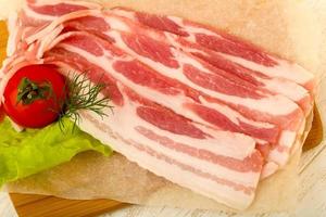 Raw bacon dish view photo