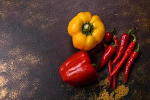 Fresh torn red sweet pepper from the autumn harvest photo