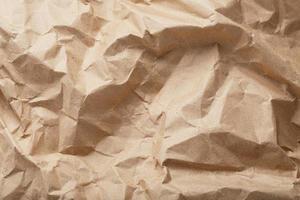 Craft crumpled paper as a texture background. photo