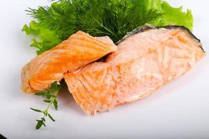 Steamed salmon on the plate photo