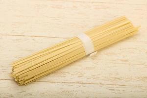 Udon noodles on wooden background photo