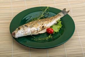 Grilled seabass on wood photo