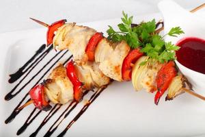 Chicken skewer on the plate photo