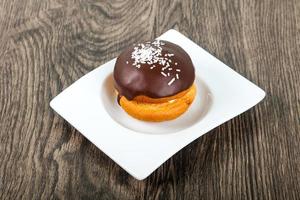 Bouchee cake in a bowl on wooden background photo