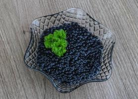 Black caviar dish view photo
