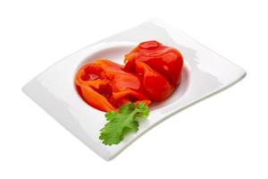 Marinated pepper on white photo