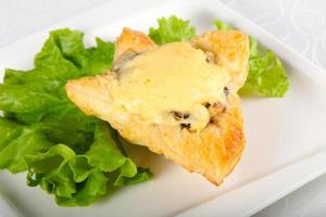 Mushroom pastry on the plate and white background photo