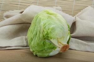 iceberg salad on wood photo