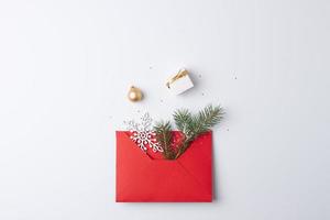 Christmas decorations with gift on white background. Flat lay, copy space photo