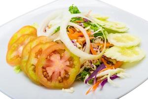 Vegetable salad on white photo