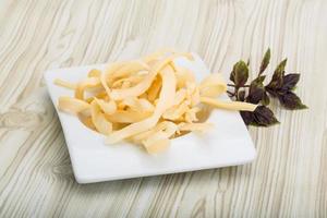 Dry calamari on wood photo