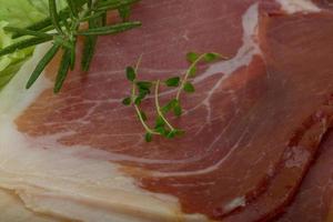 Prosciutto on wood photo