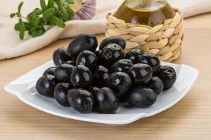 Black olives dish view photo