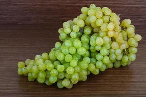 Green grape on wood photo