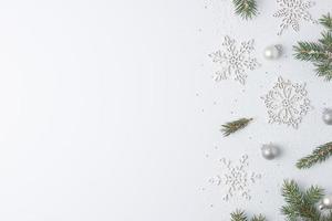 Christmas grey minimal background with snowflakes. Flat lay, copy space photo