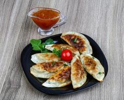 Gyoza on plate photo