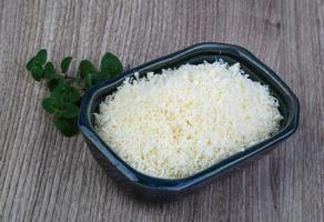 Shredded parmesan dish view photo