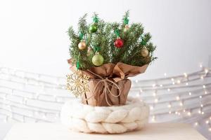 Zero waste Christmas natural decoration with rosemary as alternative Christmas tree on white background. Close up, copy space photo