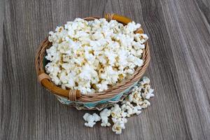 Popcorn on wood photo