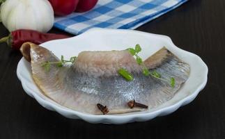 Herring fillet dish view photo