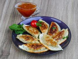 Gyoza on plate photo