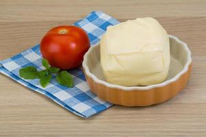 Mozzarella cheese on wood photo