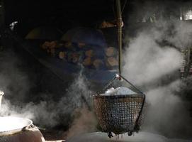 The ancient way of mining rock salt process in the bamboo basket Nan Thailand photo