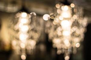 pattern, background. light crystal chandelier with blurred focus photo