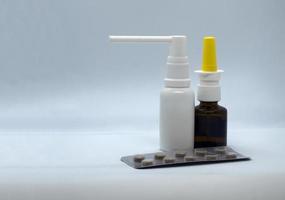 Throat spray, pills and nasal drops photo