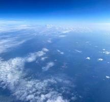 View from the airplane window. View of the sky and clouds. photo