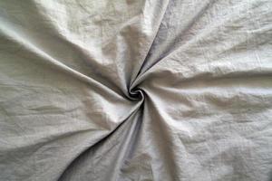 Background, texture, gray wrinkled fabric, cotton. photo