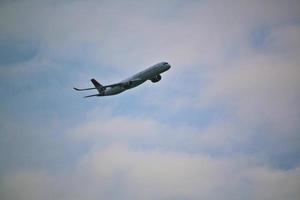 Manchester in the UK in October 2022. A Plane taking off from Manchester Airport photo