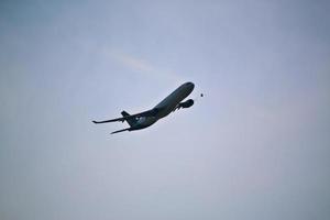 Manchester in the UK in October 2022. A view of a Plane taking off from Manchester Airport photo