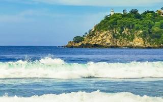 Extremely huge big surfer waves at beach Puerto Escondido Mexico. photo