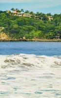 Extremely huge big surfer waves at beach Puerto Escondido Mexico. photo