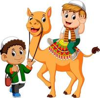 niño pequeño montando camello vector