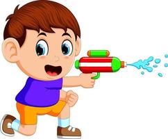 niño jugando con pistola de agua vector
