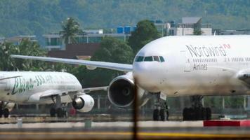 PHUKET, THAILAND DECEMBER 2, 2018 - NordWind Airlines Boeing 777 VP BJH towing before departure, International Phuket Airport video