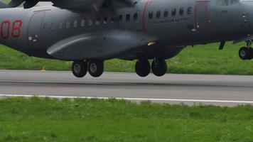 ALMATY, KAZAKHSTAN MAY 5, 2019 - Kazakhstan Armed Forces CASA C 295 military transport aircraft touching landing strip and braking at Almaty airport. video