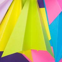 A closeup shot of colorful handmade paper planes photo